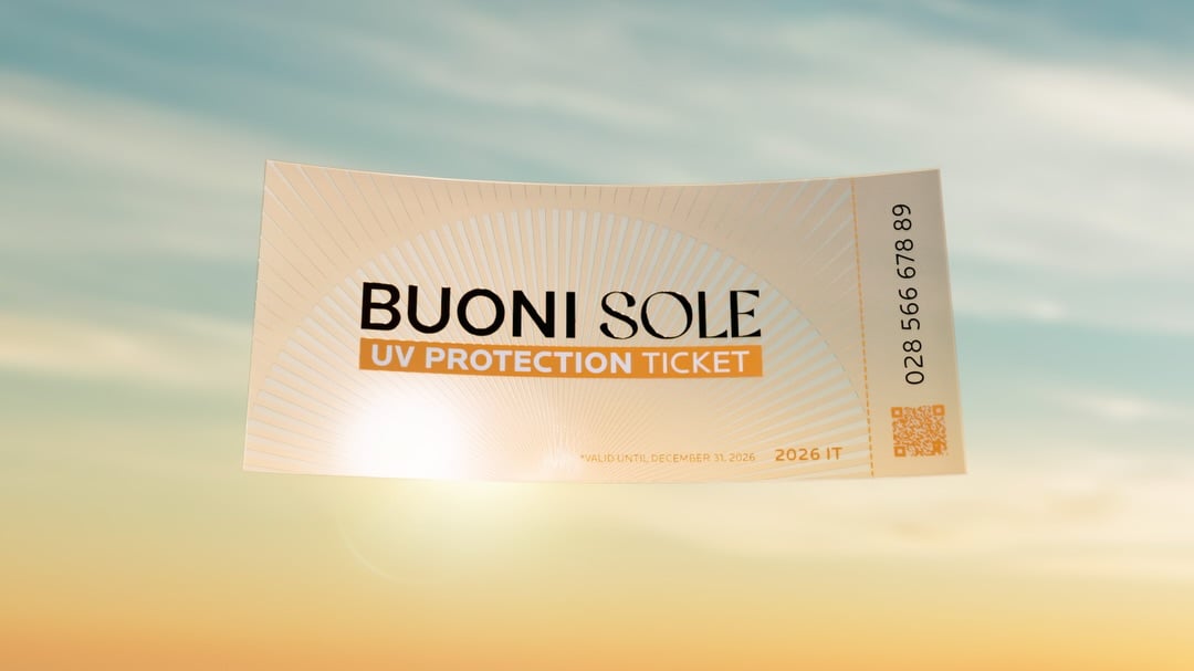 A single Buoni Sole UV Protection Ticket floating against a hazy golden sky, showing the sun ray logo, QR code, serial number, and 