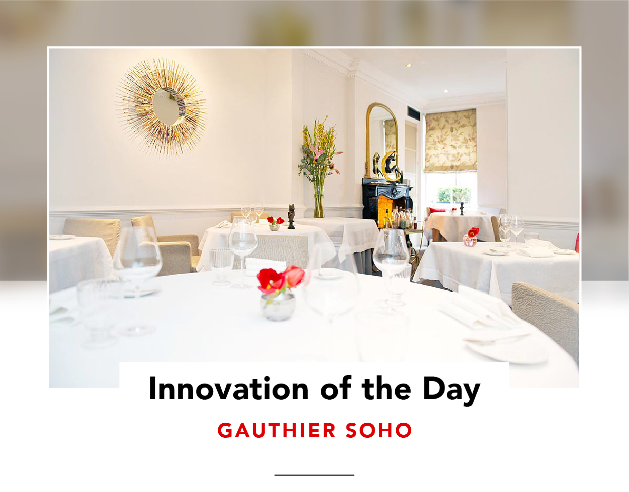 Tables set in an empty restaurant dining room