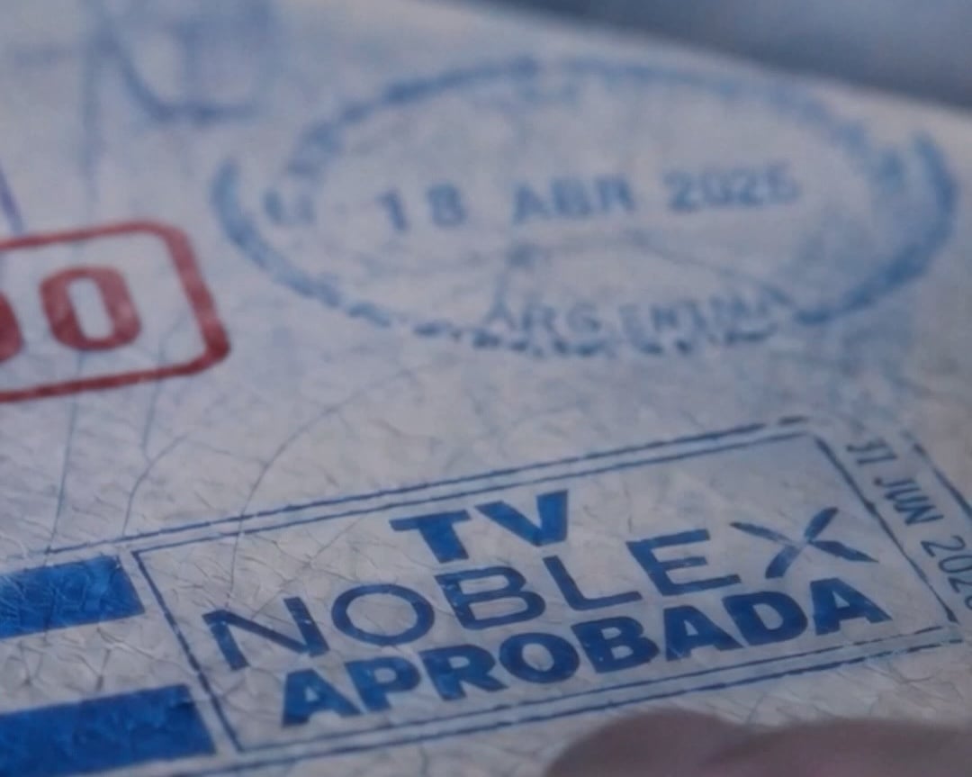 Close-up of a passport page stamped 