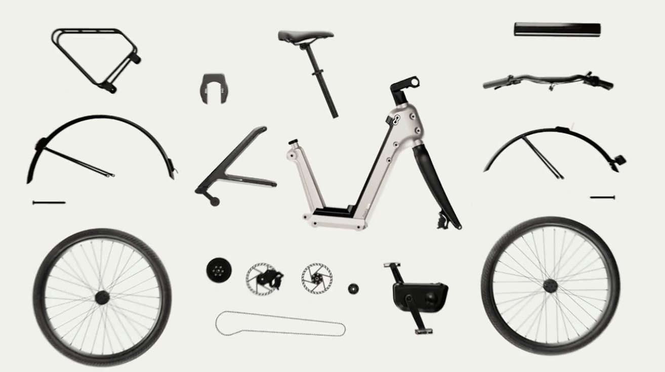 Bicycle parts all laid out separately against a white background