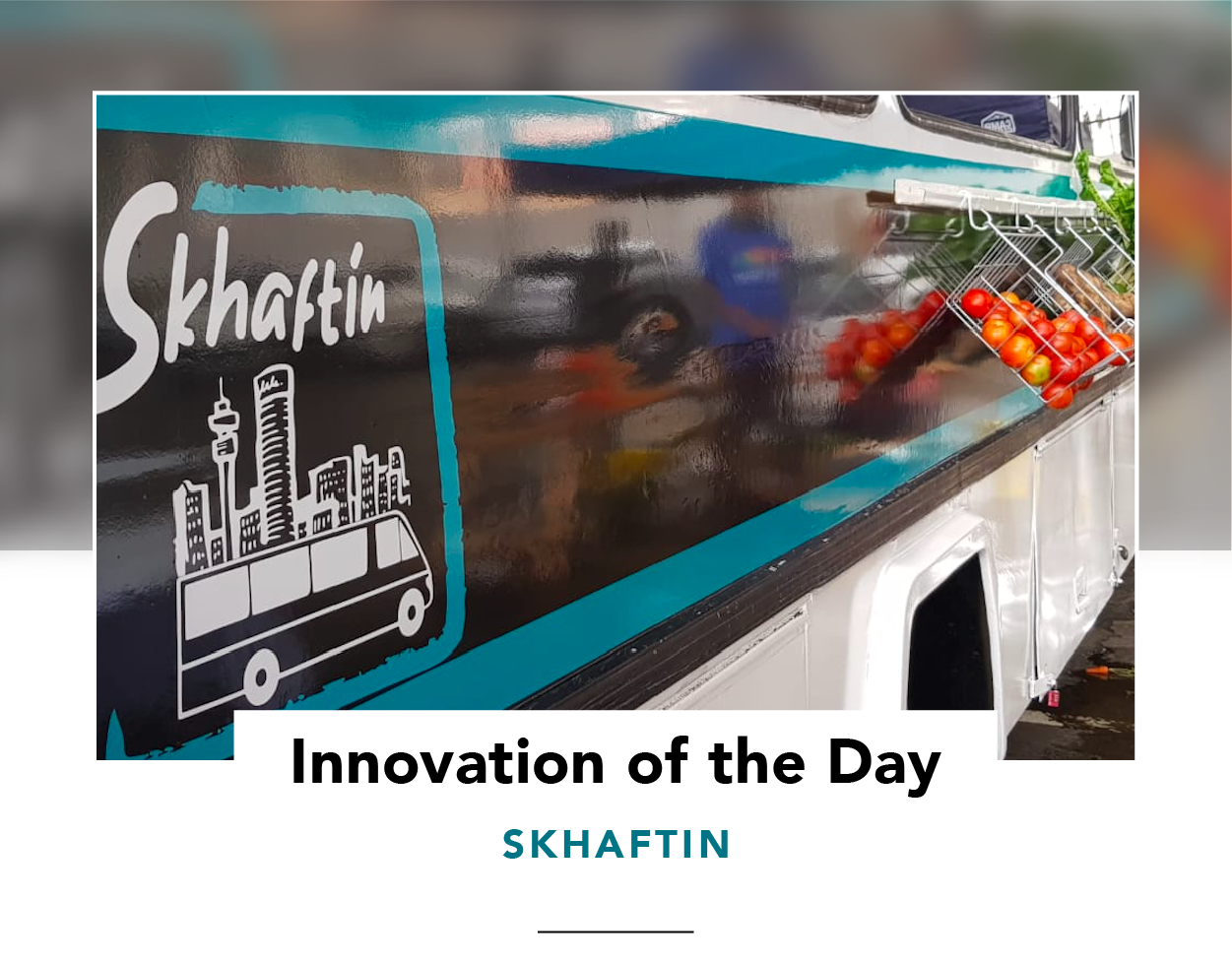 Side view of the Skhaftin bus, with baskets of vegetables hung outside