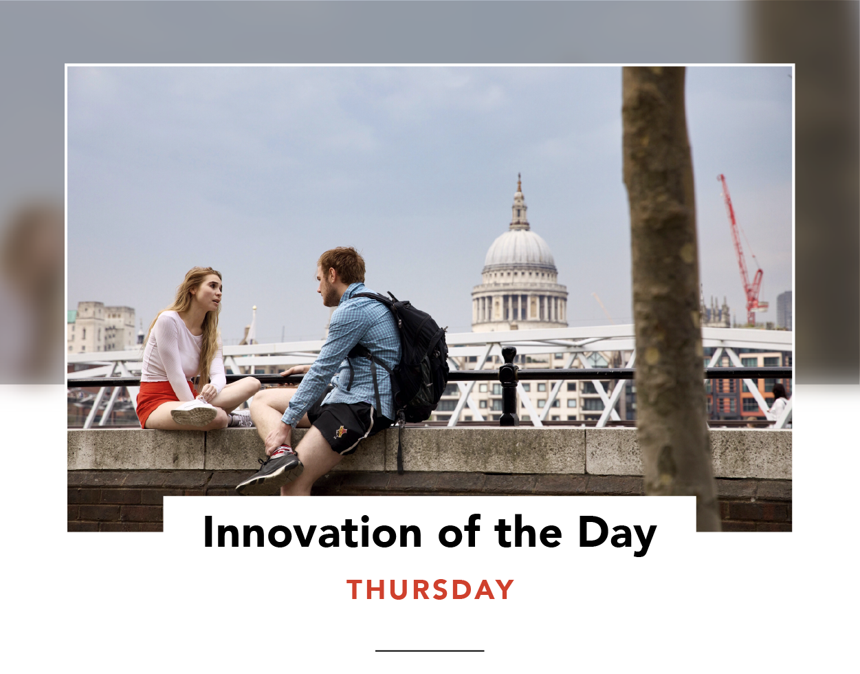 A woman and a man chatting by the Thames
